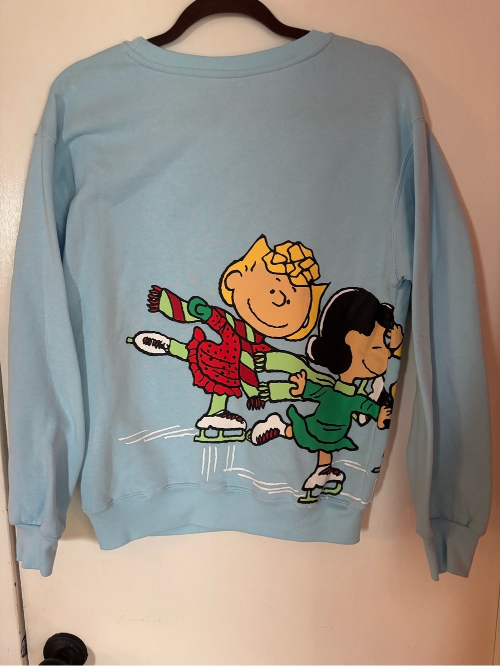 Peanuts Light Blue Crewneck Sweatshirt with Ice Skating Graphic - Picture 10 of 10